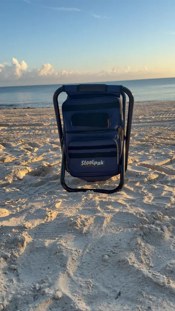 Navy StoolPak on a beach at sunset