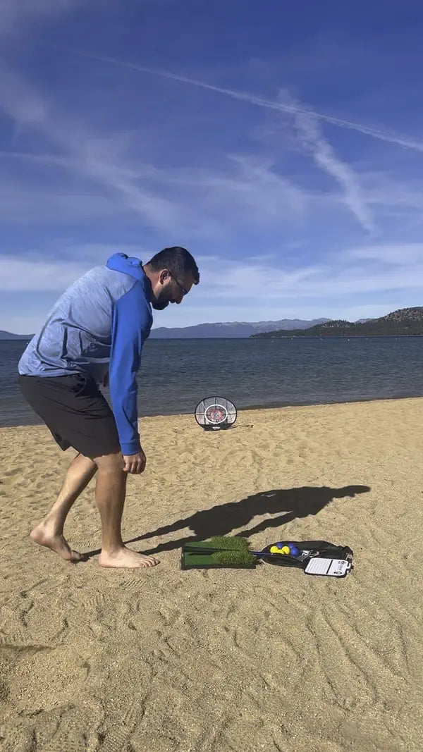 Frank DeLuca on a shore about to chip toward a Wedge Master net