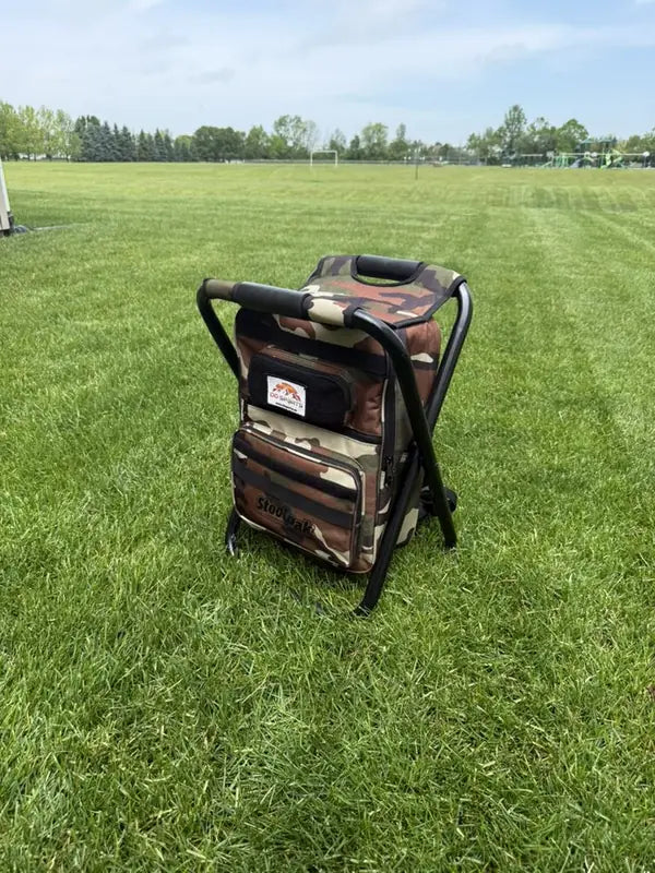 Camo StoolPak on a soccer field