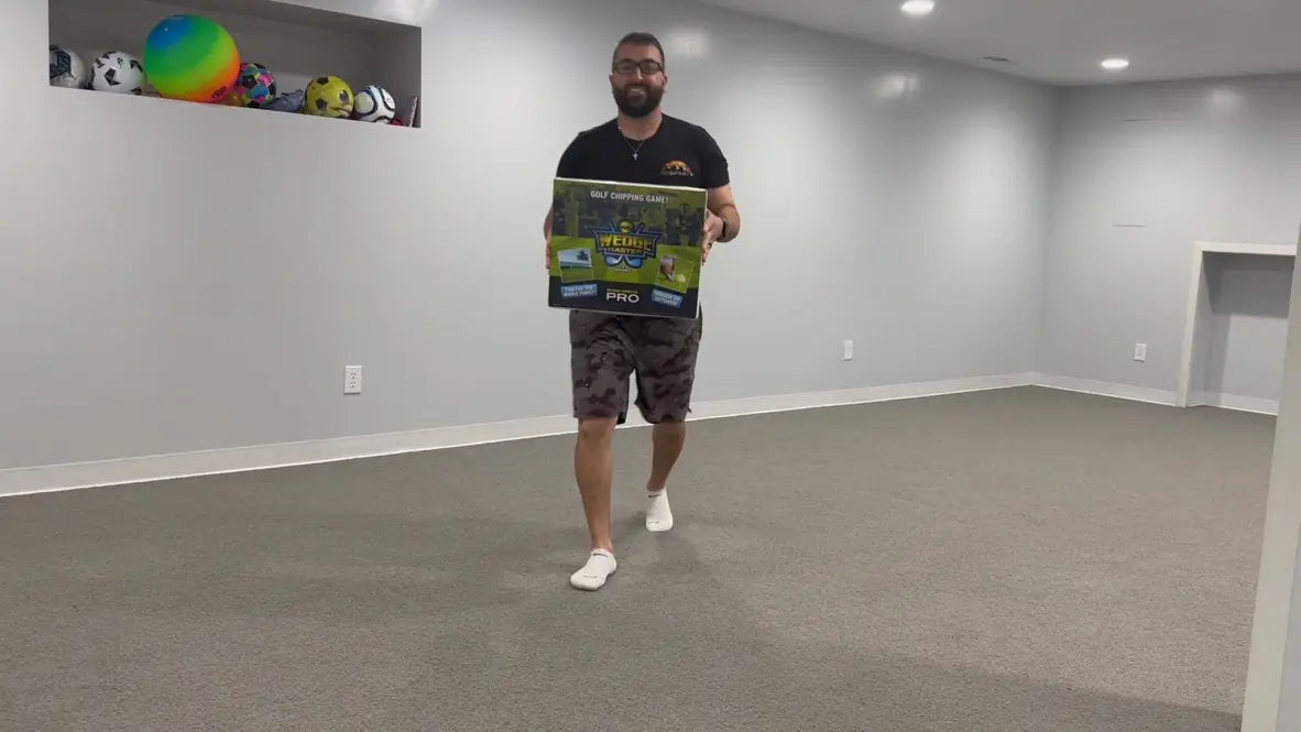 Frank DeLuca indoors holding a Wedge Master Pro box