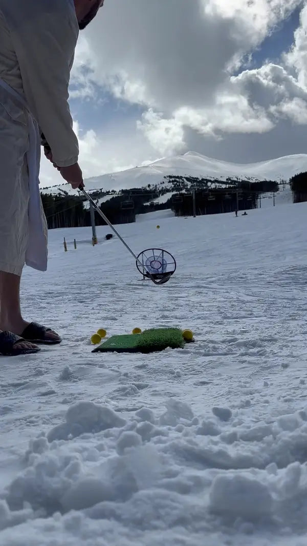 Chipping in the snow toward a Wedge Master net